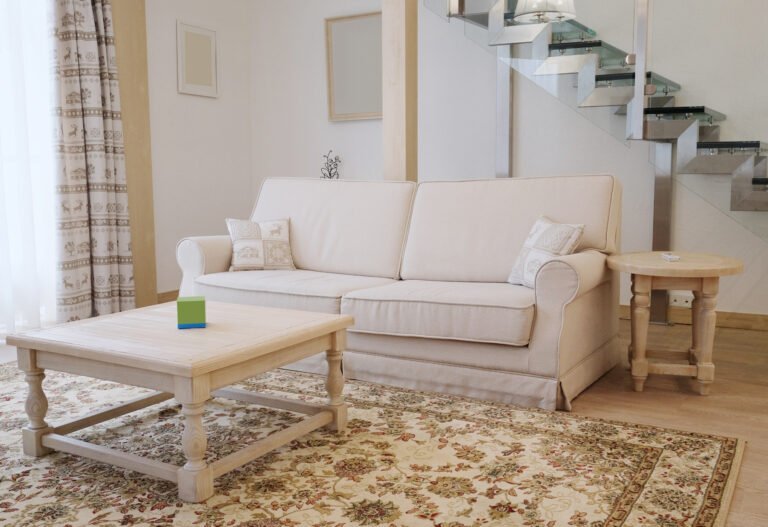 Light Rug with a Beige Couch