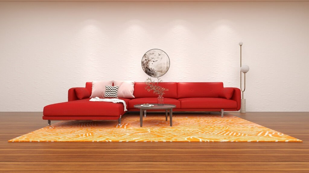 Orange Patterned Rug with a Red Sofa