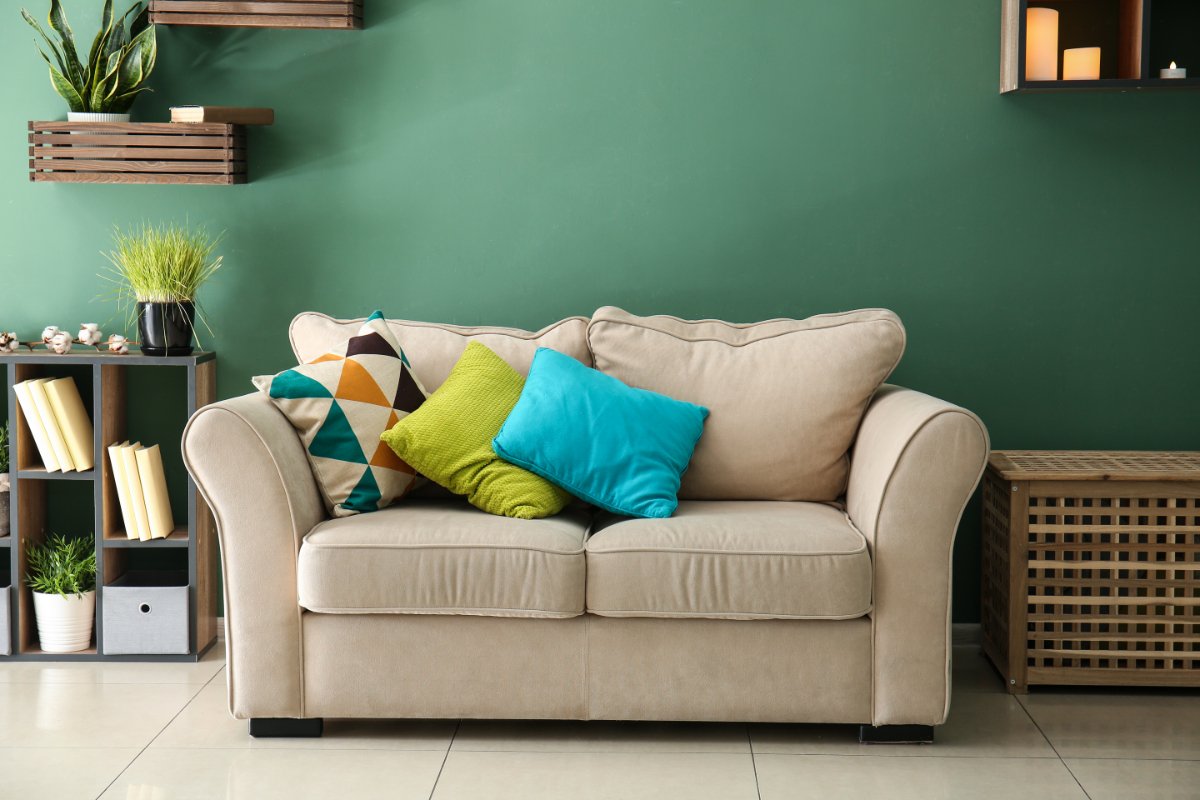 Beige Sofa With Lime and Blue Cushions