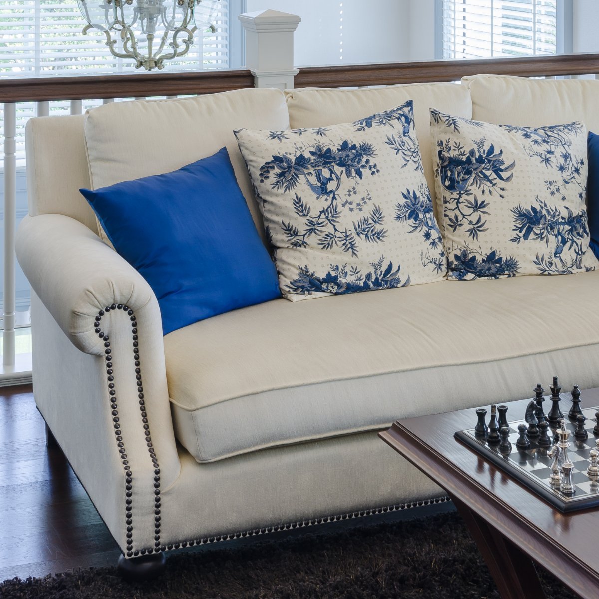 Bright Blue Throw Pillows on Beige Couch