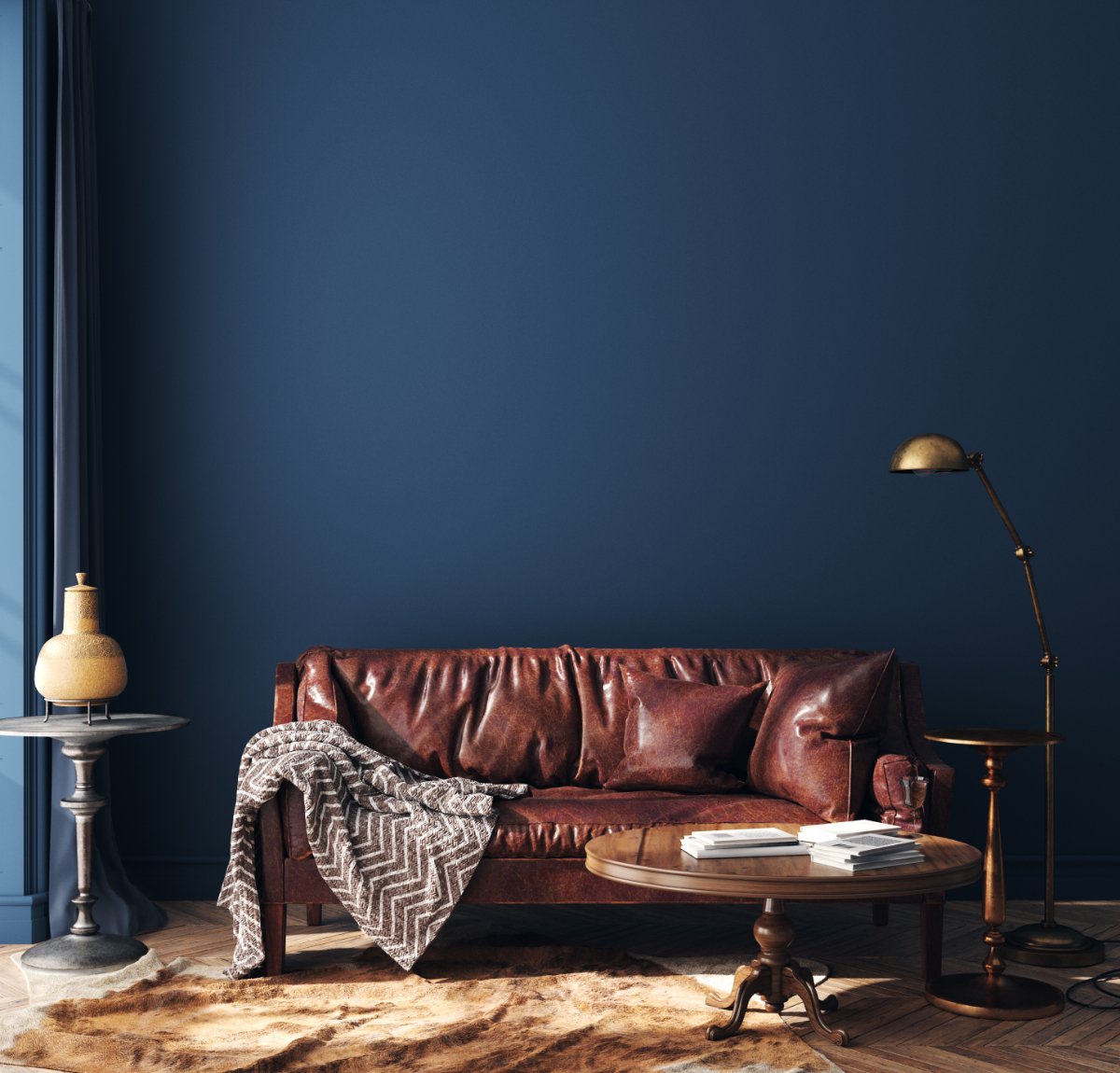 Living-Area-With-Brown-Couch-and-Dark-Blue-Walls