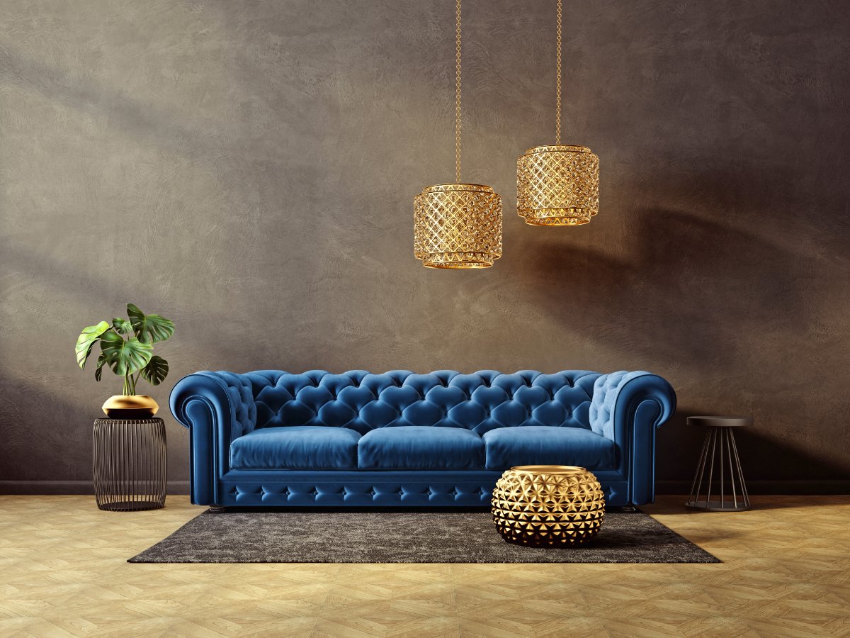 Living Room Decor With Blue Sofa and Gold Accents