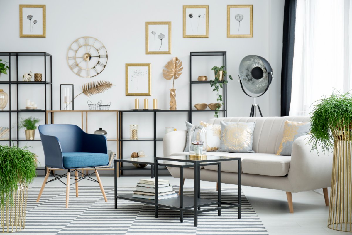 White Living Room Interior With Metallic Gold Accents